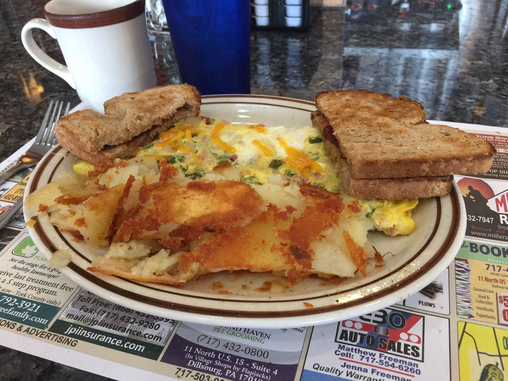 omelette with home fries and toastw